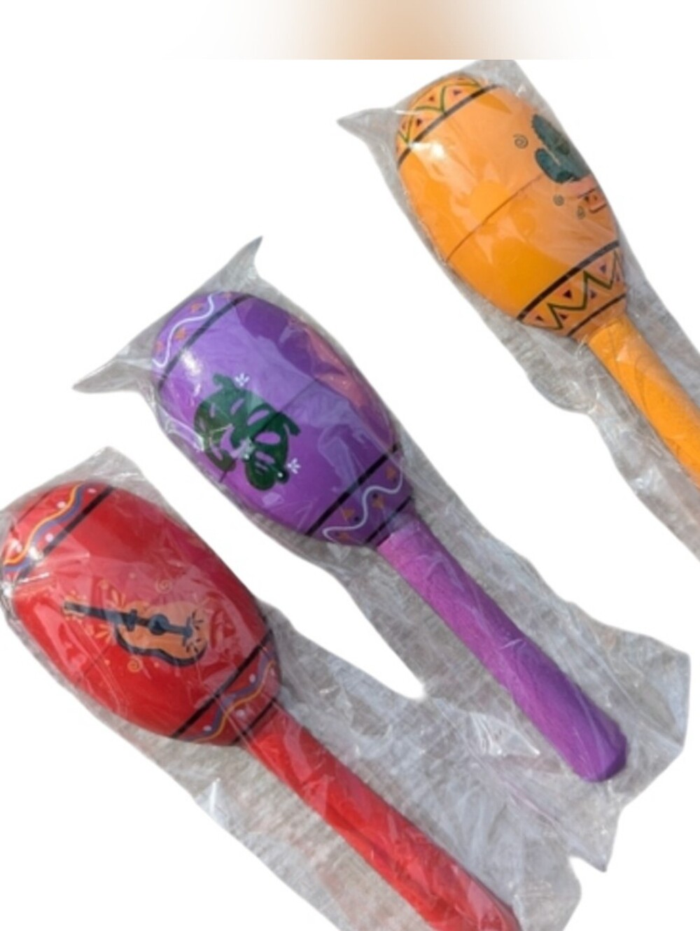 Maraca's Set Of 3. Wooden. Mini. One Red, One Orange & One Purple. Ind. Packaged